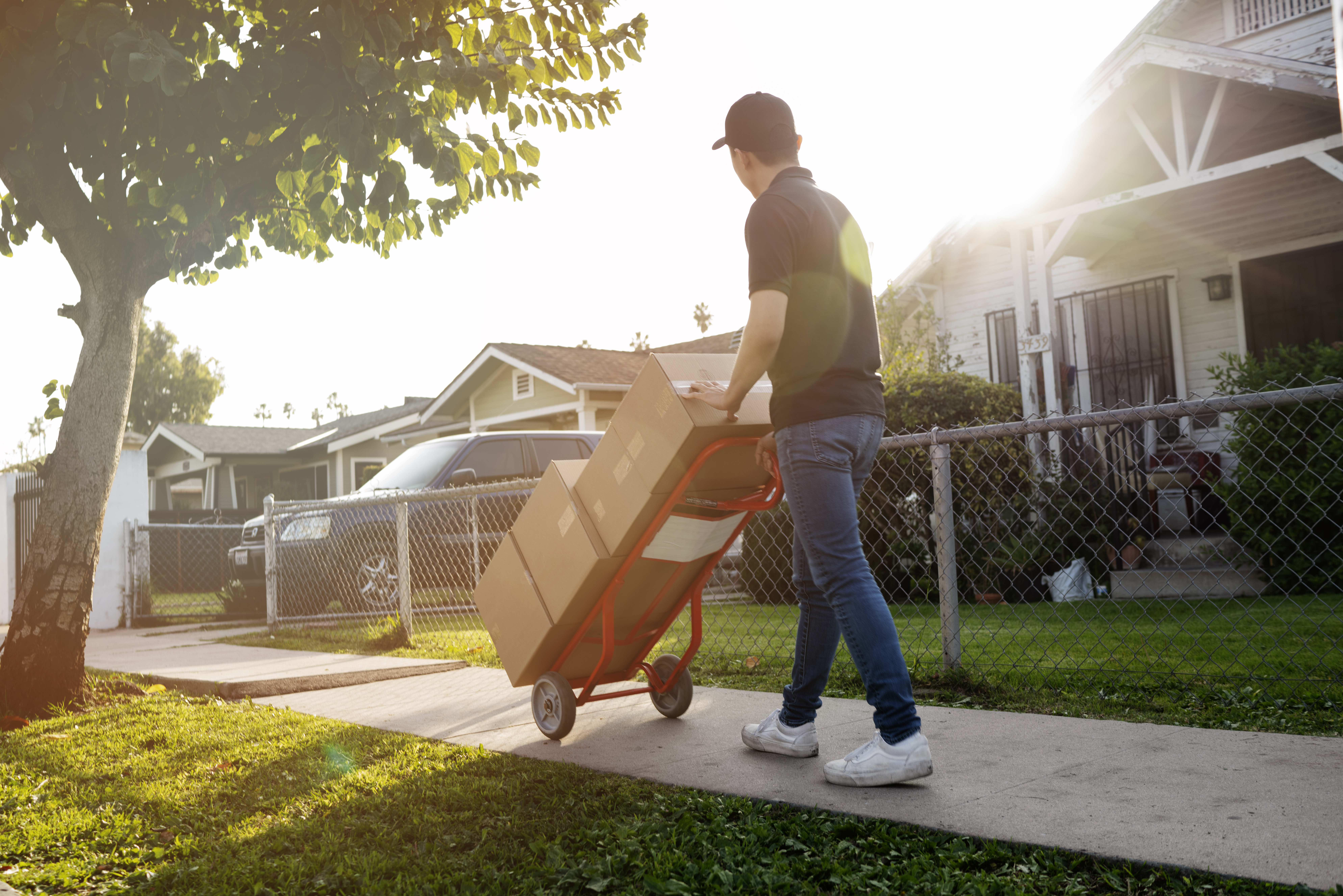 delivery-person-getting-parcel-out-delivery (1)